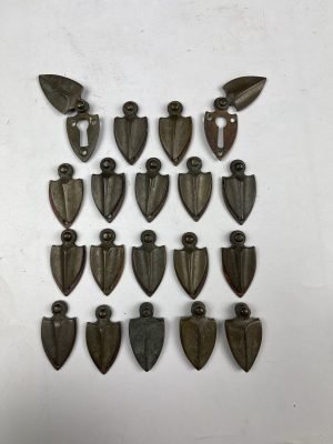 Run of 18 key hole covers