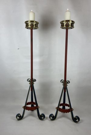 Pair of floor standing candle sticks